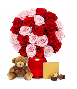 Κόκκινα και ροζ τριαντάφυλλα με σοκολάτες και μια αρκούδα