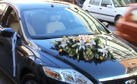 Decoration of the Wedding Car in White and Yellow Color