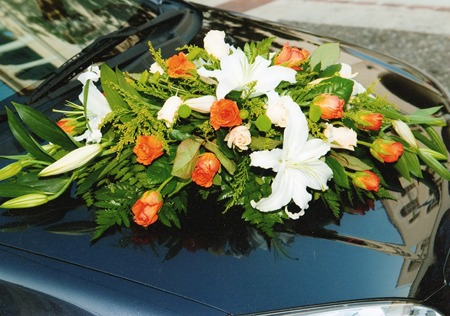 Decoration of the Wedding Car with Orange Roses