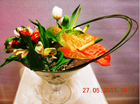 Flower arrangement in glass