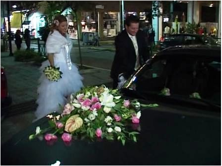 Decoration of the Wedding Car in White and Fuchsia Color