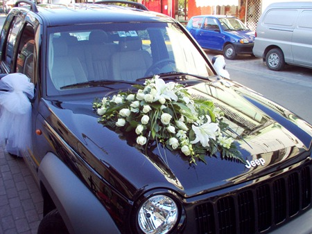 Decoration of the Wedding Car with White Roses