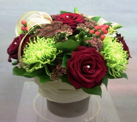 Red Roses with Hypericum in a Grey Ceramic