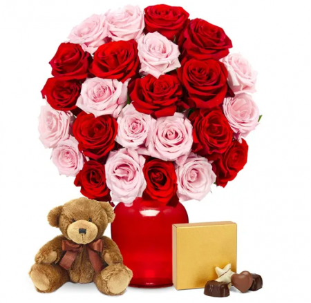 Κόκκινα και ροζ τριαντάφυλλα με σοκολάτες και μια αρκούδα