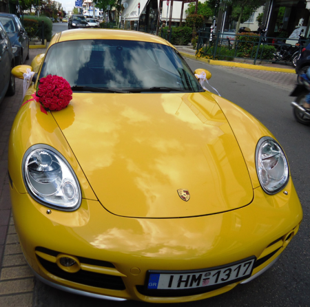 Car Decoration with a bouquet of simple red roses